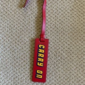 MZ Wallace “Carry On” charm
